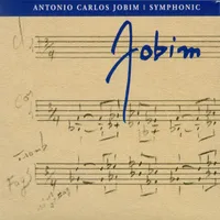 Capa do álbum "Symphonic Jobim". Uma partitura escrita a mão em um papel amarelado. No canto superior direito a assinatura de Tom Jobim está em destaque na cor azul.